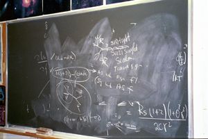 Chalkboards with complicated equations can be found all over CERN